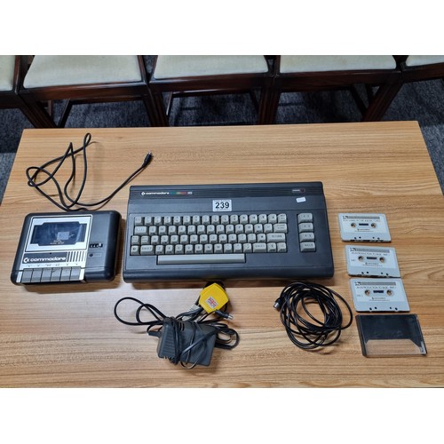 239 - A Commodore 16 gaming system with the commodore cassette player. Power and aerial lead included and ... 