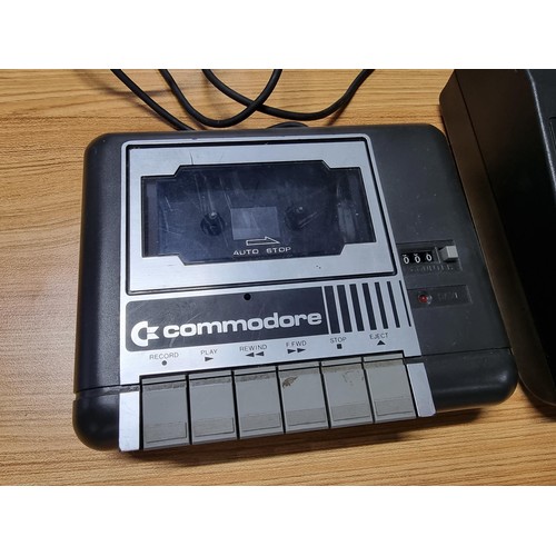 239 - A Commodore 16 gaming system with the commodore cassette player. Power and aerial lead included and ... 