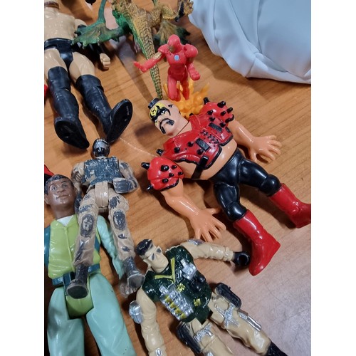 241 - A large collection of approx 26x action figures mostly of wrestlers from the early 2000's and on. To... 