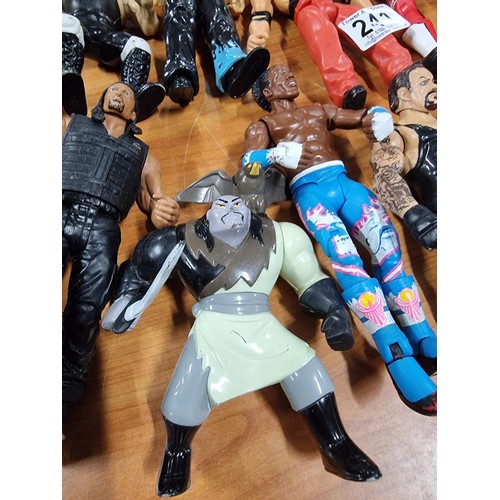 241 - A large collection of approx 26x action figures mostly of wrestlers from the early 2000's and on. To... 