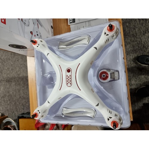 252 - A boxed Syma X8SW quadro copter drone with Wi-Fi video/photo HD camera, capable of flip stunts, etc.... 