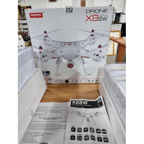 252 - A boxed Syma X8SW quadro copter drone with Wi-Fi video/photo HD camera, capable of flip stunts, etc.... 