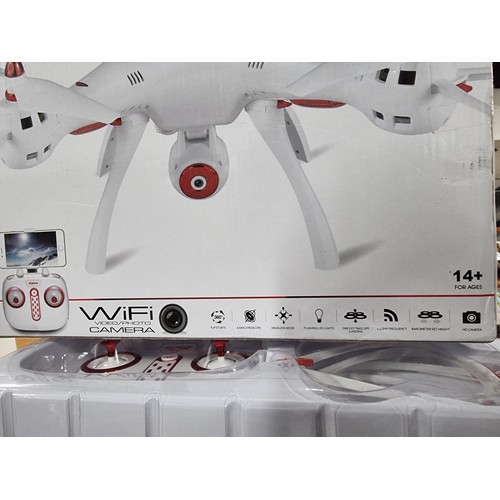 252 - A boxed Syma X8SW quadro copter drone with Wi-Fi video/photo HD camera, capable of flip stunts, etc.... 