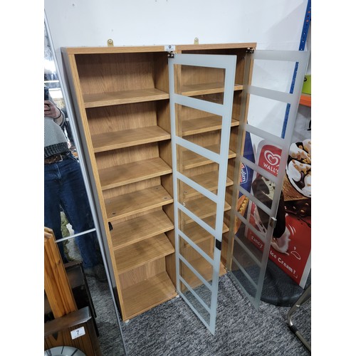 8 - Pair of glass front shelf units, each with 6 shelves some shelf pins are missing standing 123.5cm wi... 