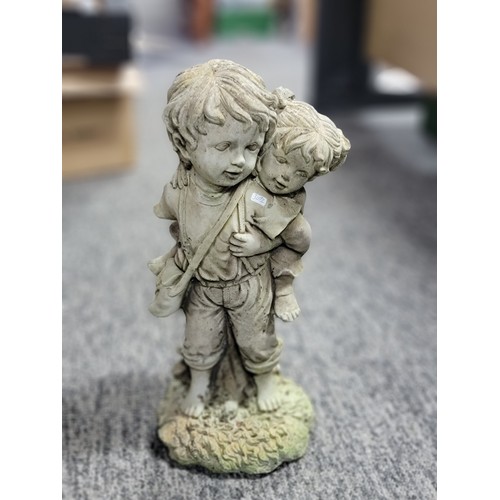 14 - Stoneware figure of two children, in overall good condition height 48cm base diameter 20cm