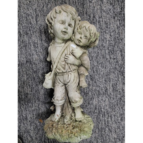 14 - Stoneware figure of two children, in overall good condition height 48cm base diameter 20cm