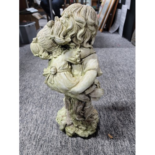 14 - Stoneware figure of two children, in overall good condition height 48cm base diameter 20cm