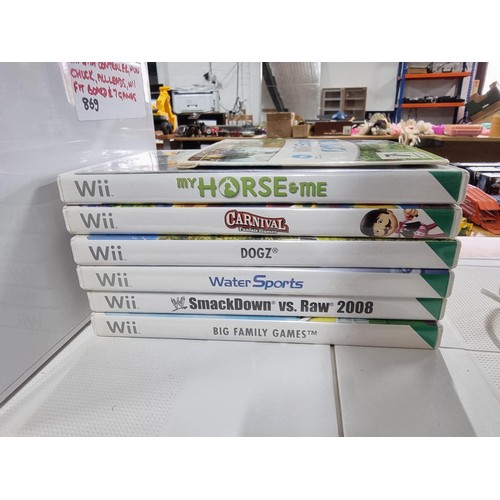 255 - A comprehensive Nintendo Wii games console set complete with Wii fit board and 7 games and controlle... 