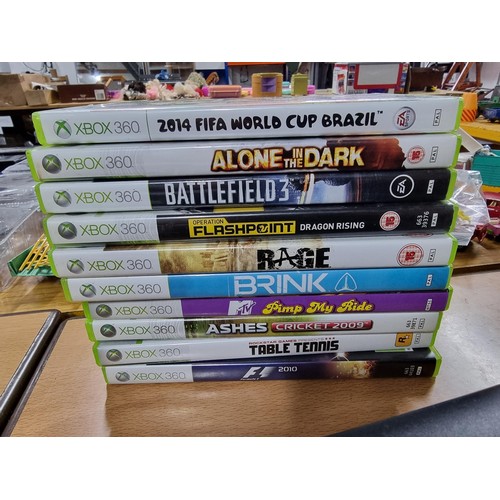 257 - An Xbox 360 games console complete with an Xbox controller and 10 good games, 120GB hard drive, in f... 