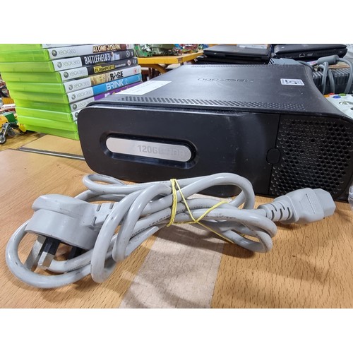 257 - An Xbox 360 games console complete with an Xbox controller and 10 good games, 120GB hard drive, in f... 