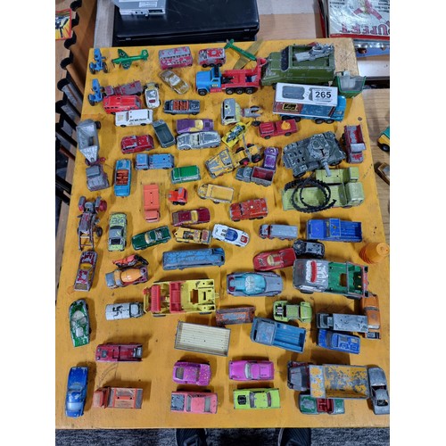 265 - A large quantity of various die-cast models cars, trucks, tanks, etc, from many different maker incl... 