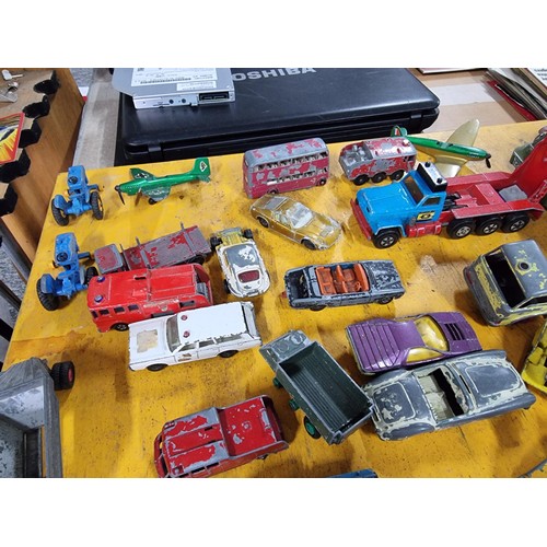 265 - A large quantity of various die-cast models cars, trucks, tanks, etc, from many different maker incl... 