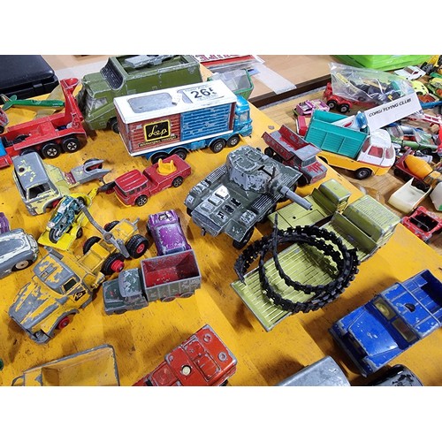 265 - A large quantity of various die-cast models cars, trucks, tanks, etc, from many different maker incl... 