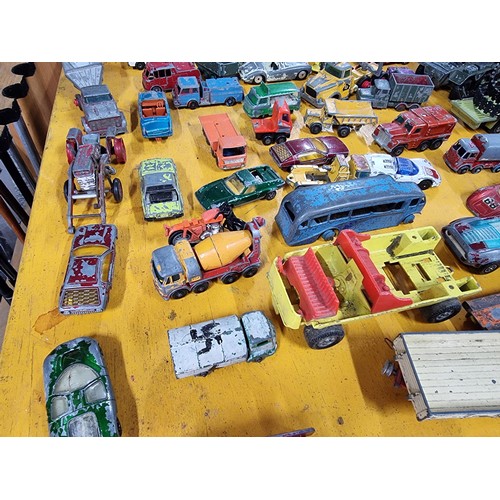 265 - A large quantity of various die-cast models cars, trucks, tanks, etc, from many different maker incl... 