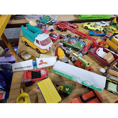 266 - A large quantity of various die-cast models cars, trucks, tanks, etc, from many different maker incl... 