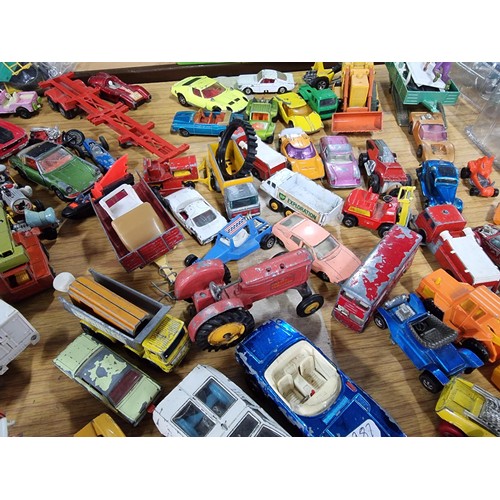 266 - A large quantity of various die-cast models cars, trucks, tanks, etc, from many different maker incl... 