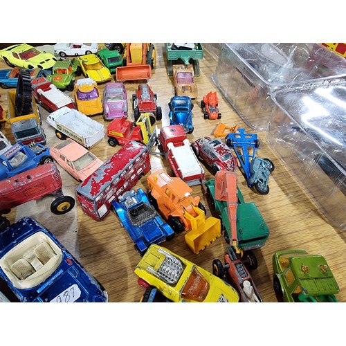 266 - A large quantity of various die-cast models cars, trucks, tanks, etc, from many different maker incl... 