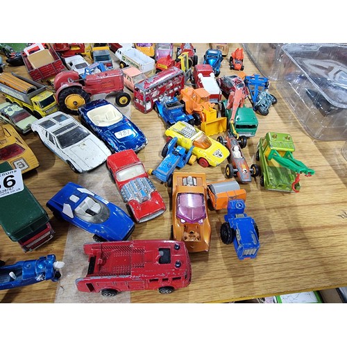 266 - A large quantity of various die-cast models cars, trucks, tanks, etc, from many different maker incl... 