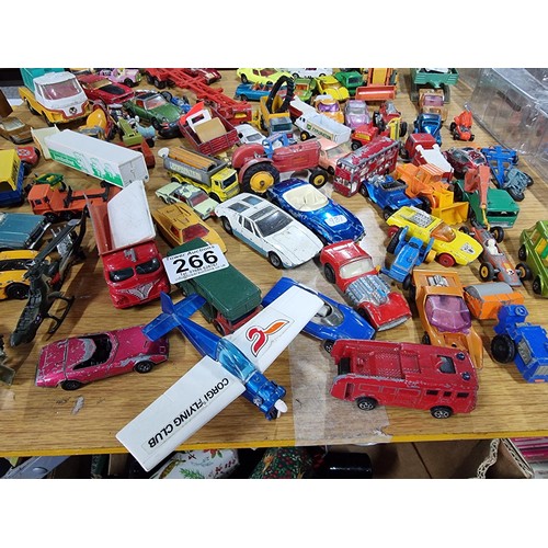 266 - A large quantity of various die-cast models cars, trucks, tanks, etc, from many different maker incl... 