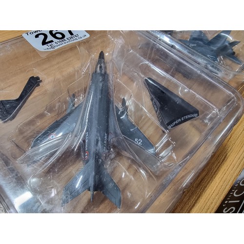 267 - A quantity of new and sealed die-cast vehicles to include 4x diecast model planes with stands and 4x... 