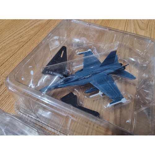 267 - A quantity of new and sealed die-cast vehicles to include 4x diecast model planes with stands and 4x... 