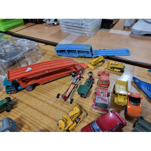 268 - A large quantity of various die-cast models cars, trucks, tanks, etc, from many different maker incl... 