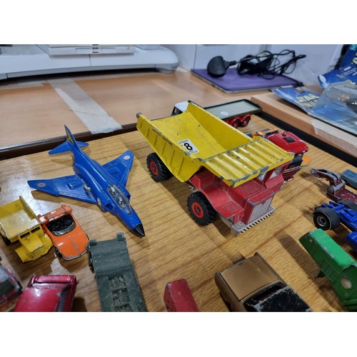 268 - A large quantity of various die-cast models cars, trucks, tanks, etc, from many different maker incl... 