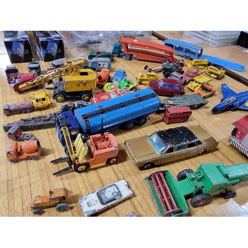 268 - A large quantity of various die-cast models cars, trucks, tanks, etc, from many different maker incl... 