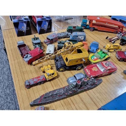 268 - A large quantity of various die-cast models cars, trucks, tanks, etc, from many different maker incl... 