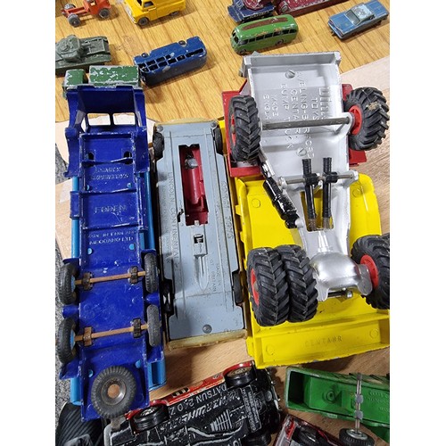 268 - A large quantity of various die-cast models cars, trucks, tanks, etc, from many different maker incl... 