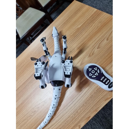 270 - A Roboreptile Remote control toy model, with moving head neck and tail and lights. In working condit... 