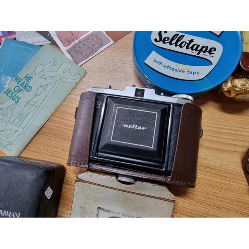 272 - A box various collectables to include a Zeiss ikon nettar camera a Kodak retinette camera, a King Ge... 