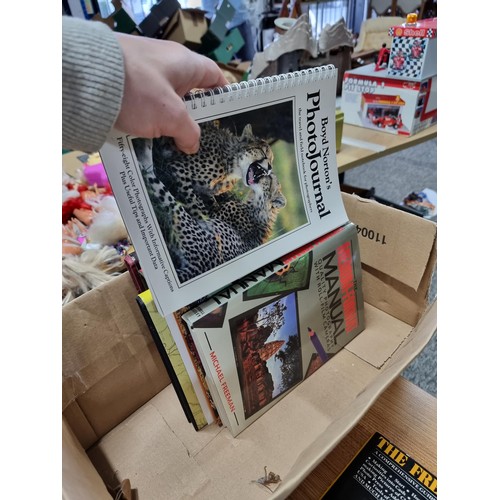 274 - A box containing a quantity of books relating to photography to include a large quantity Hasselblad ... 