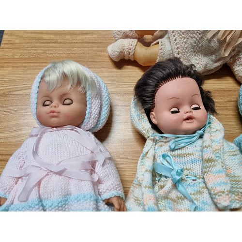 282 - A collection of 7x good quality early 1960's dolls, many with hand knitted clothing and many have nu... 