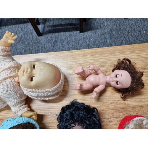 282 - A collection of 7x good quality early 1960's dolls, many with hand knitted clothing and many have nu... 