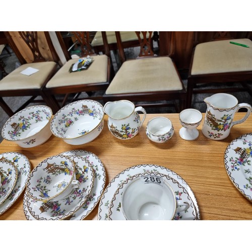 286 - A 35 piece part tea set by Aynsley made for Lawleys.