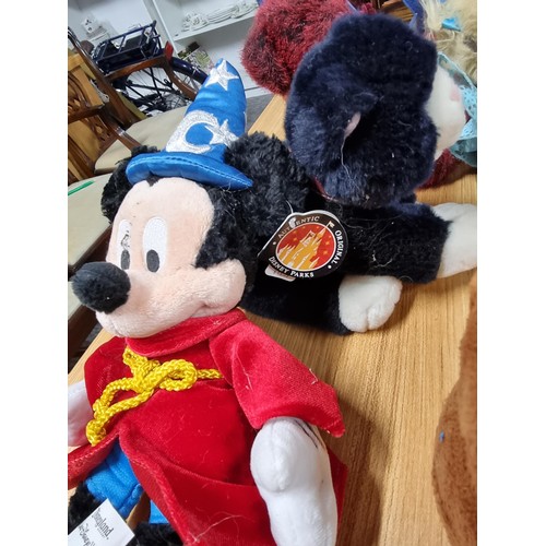 287 - A collection of 12 soft toys some with tags to include Keel toys, a Mickey Mouse Fantasia plush with... 