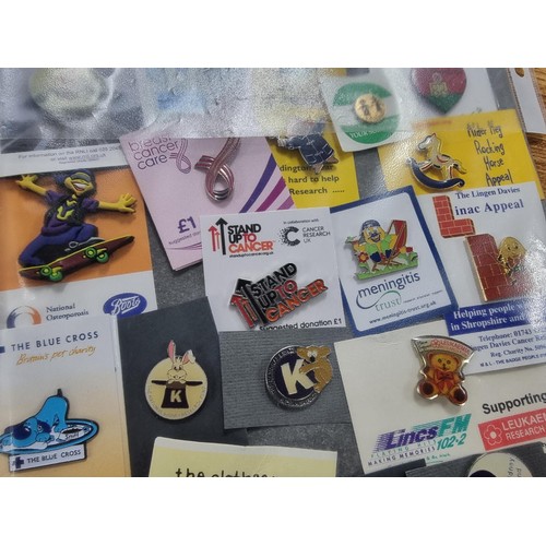 294 - Very large qty. of various collectable pin badges mostly charity related to inc a suite of 12 x vari... 