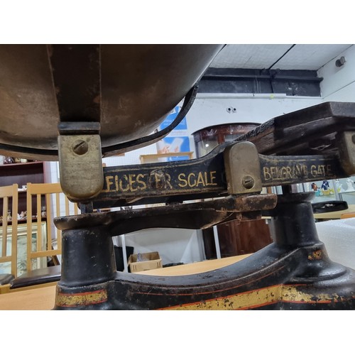 304 - Good antique pair of shop scales with a 5 x weights marked Leicester scale 38 belgrave gate. In good... 