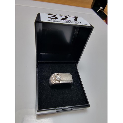 334 - A small gents 925 silver ring inset with sparkly CZ crystal stones. In clean condition and boxed. Si... 