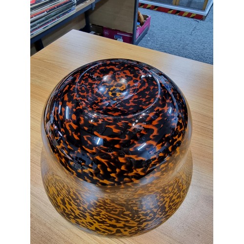 318 - A large impressive glass bowl with a speckled leopard print style design by Laguna with a good finis... 