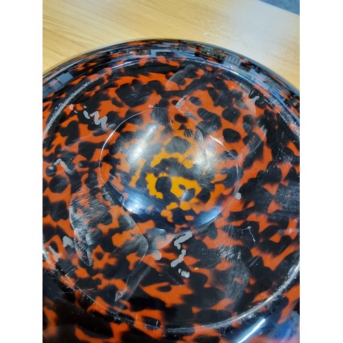 318 - A large impressive glass bowl with a speckled leopard print style design by Laguna with a good finis... 