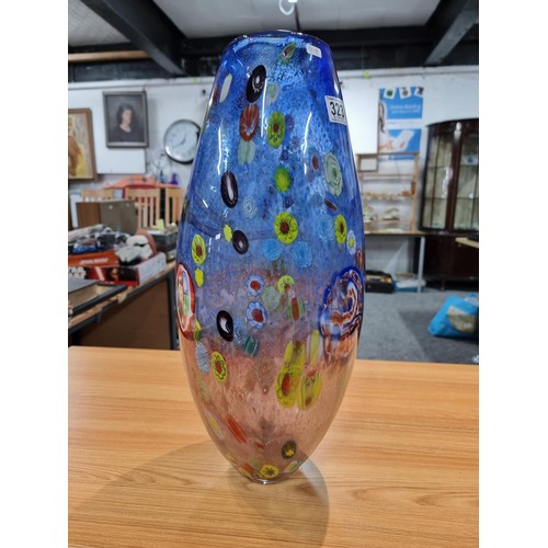 323 - A very large and impressive art glass vase with a torpedo shape featuring colourful bright splashes ... 