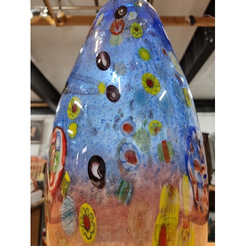 323 - A very large and impressive art glass vase with a torpedo shape featuring colourful bright splashes ... 