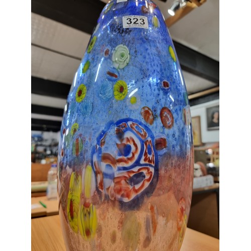 323 - A very large and impressive art glass vase with a torpedo shape featuring colourful bright splashes ... 