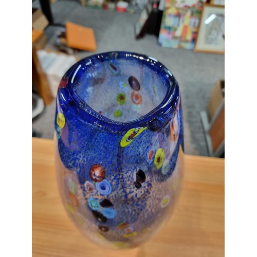 323 - A very large and impressive art glass vase with a torpedo shape featuring colourful bright splashes ... 