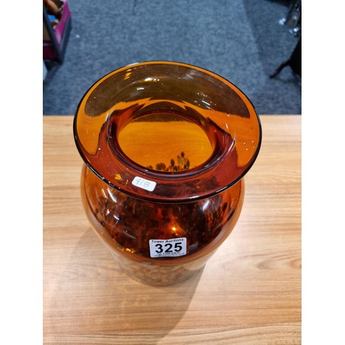 325 - A very large and impressive amber art glass vase with a colourful speckled design featuring greens, ... 