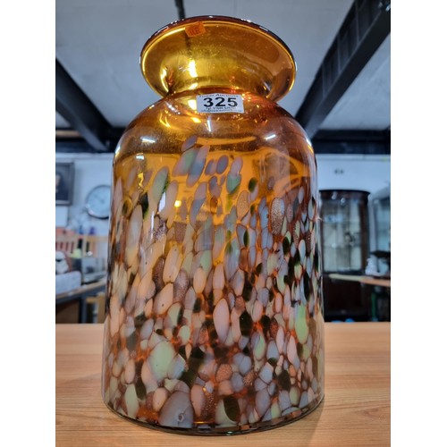 325 - A very large and impressive amber art glass vase with a colourful speckled design featuring greens, ... 