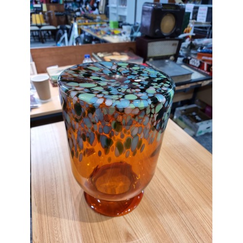 325 - A very large and impressive amber art glass vase with a colourful speckled design featuring greens, ... 