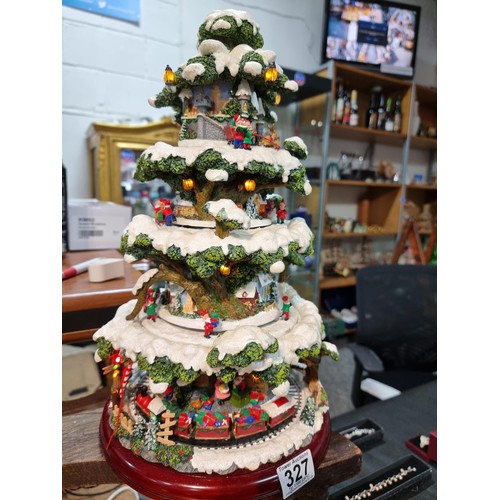 327 - A boxed winter wonderland musical tree by Festive with 4 pre lit revolving layers, musical with volu... 